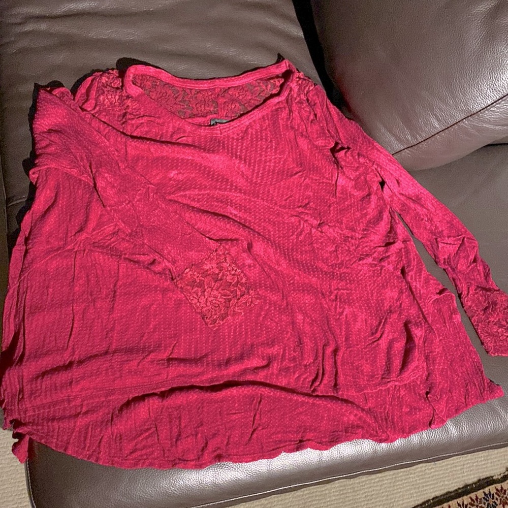 Pink long sleeved shirt with lace accents
